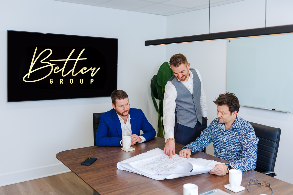 Better Group co-founders Kyle Simourd and Kyle Soutar presenting business plans during a commercial photography session in Ottawa
