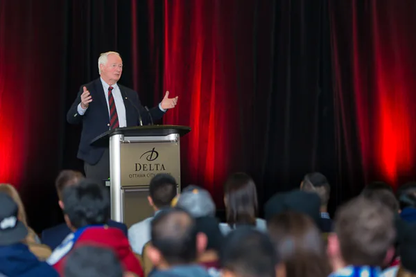 The Honourable David Johnston — 28th Governor General of Canada - presents before a room of MBA students from across Canada.  An event photo by Jeffrey Meyer.