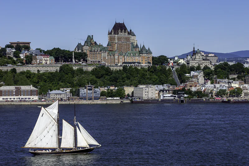 The Bluenose II sails down the St. Laurance, and past le Château Frontenac, in Québec City.   Fine art prints and licenses by Jeffrey Meyer.