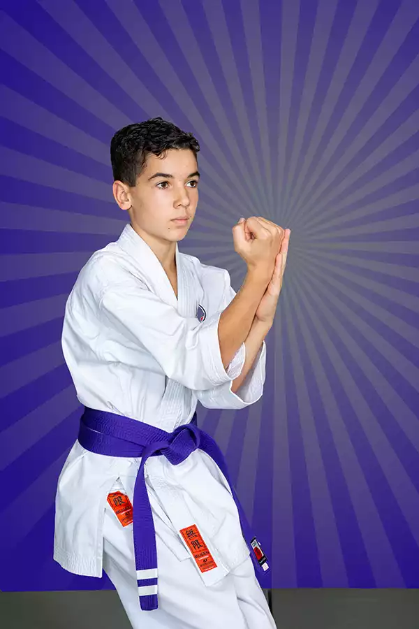 KTK Martial Arts student performing a purple belt kata.  Sport photography by Jeffrey Meyer