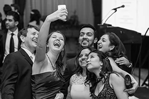 A group of friends gather for a selfie.   Event photo by Jeffrey Meyer.