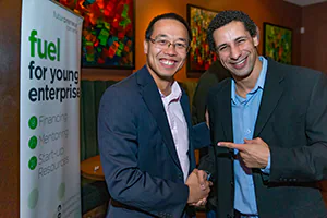 Two young entrepreneurs meet and greet at a networking event in Ottawa.    Photo by Jeffrey Meyer.